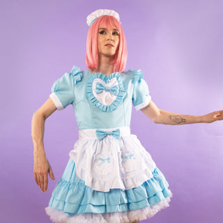 This pretty dress comes with bows that can be added to the dress.