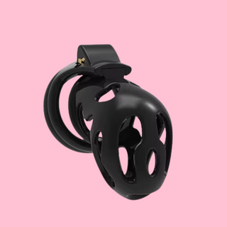 A front angled view of the Ghost C chastity cage, shown with the drop front to the cage.