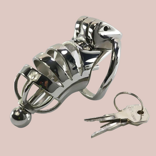 The JJ from House Of Chastity, shown fully assembled, with the urethral tube fixed in place and the 2 keys that come with the device.