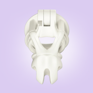 An over view of the fully assembled white chastity cage.