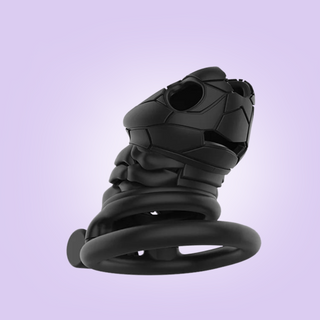 An alternate view of the chastity cage, you can see the air holes that allow for air flow and urination.