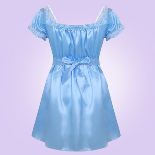 The soft blue dress, you can see that the lace detailing flows around the shoulders and sleeve cuffs.