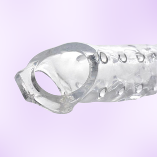 A close up of the base, you slide your penis into the body and hook the base around your balls. It is designed for comfort and durability.