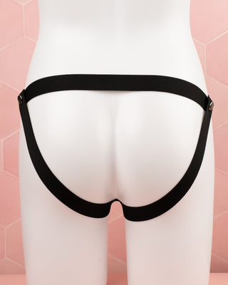 A rear view of the 4 Point Restraining Belt shows how the straps fit in a jock strap style and will spread the weight of a chastity cage.