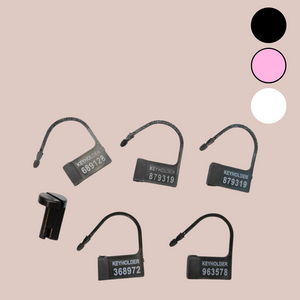 an image of the air lock pin and tags, they are shown here in black, but are also available in pink and white.