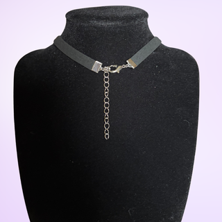 The rear view of the necklace, the adjustable necklace length and clasp can be seen.