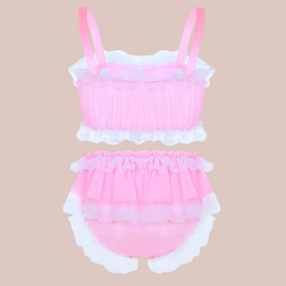 In baby pink, this bra and panties set has bandeau style bra top edged in white lace and colour matching satin bows. The panties are a high waisted design and have matching lace frills and satin bows. 