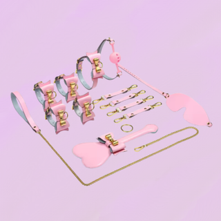 The full set of the Bow & Bind Bondage Kit shown on a purple background