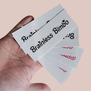 A handful of Brainless Bimbo tattoos from House Of Chastity, you can see that they come in black or pink lettering.