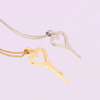 The gold key is on the left and the silver key is on the right