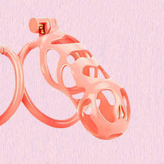 An angled view of the Cobra Love maxi chastity cage on a pink background.