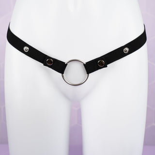 Black elasticated chastity belt shown with metal 45mm ring and the poppers that allow the waist size to be adjusted.