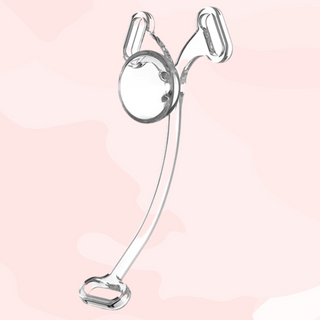 The transparent Femme Fantasy P Cage, the belt straps and the inside of the urethral cup can be seen.