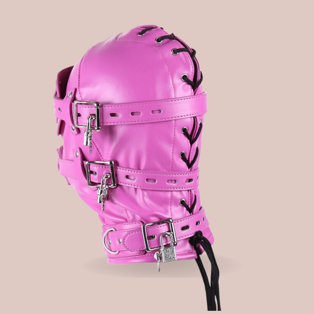 A rear view of The Fetish Hood in Rose Red Pink from House Of Chastity, you can se the tie back and the straps wrapping around the head and the buckles affixing at the side. You can also the ability to lock the buckles in place.