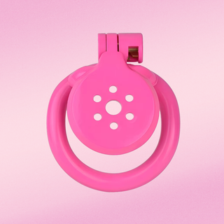 A front on view of the Flat Gatling chastity cage in bright pink, the vibrant colouring is stunning.