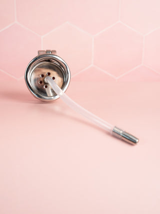 A rear view of the Flat Gatling cage, the urethral tube is shown fitted to the cage.