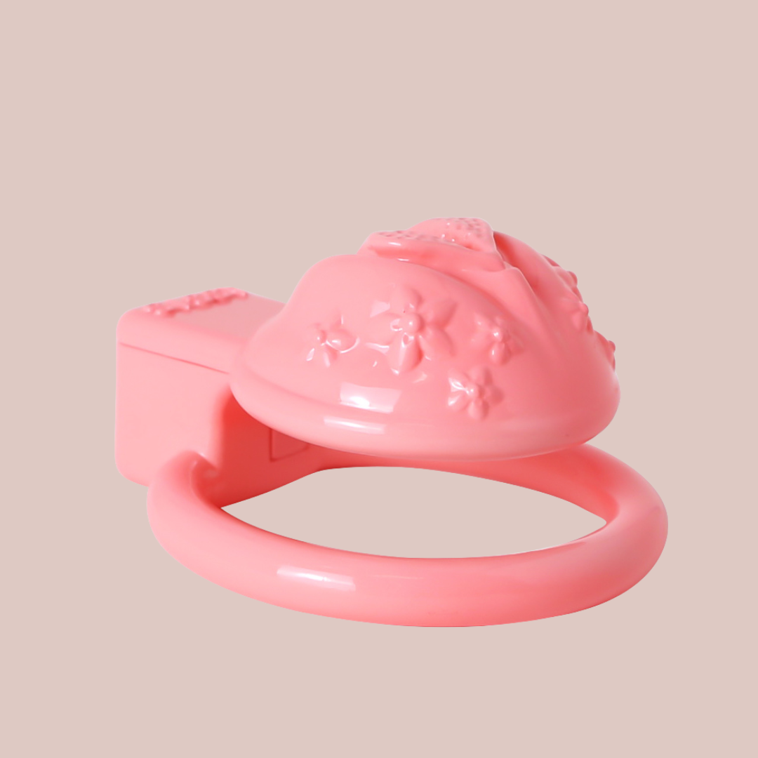 a view of the Flower Power Sissy Pussy chastity cage being laid flat, it is shown fully assembled.