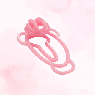 an angled view of the Fufu Clip in pink on a soft pink background