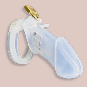 The clear silicone chastity cage shown close up , you can see it assembled and with its external padlock in place.