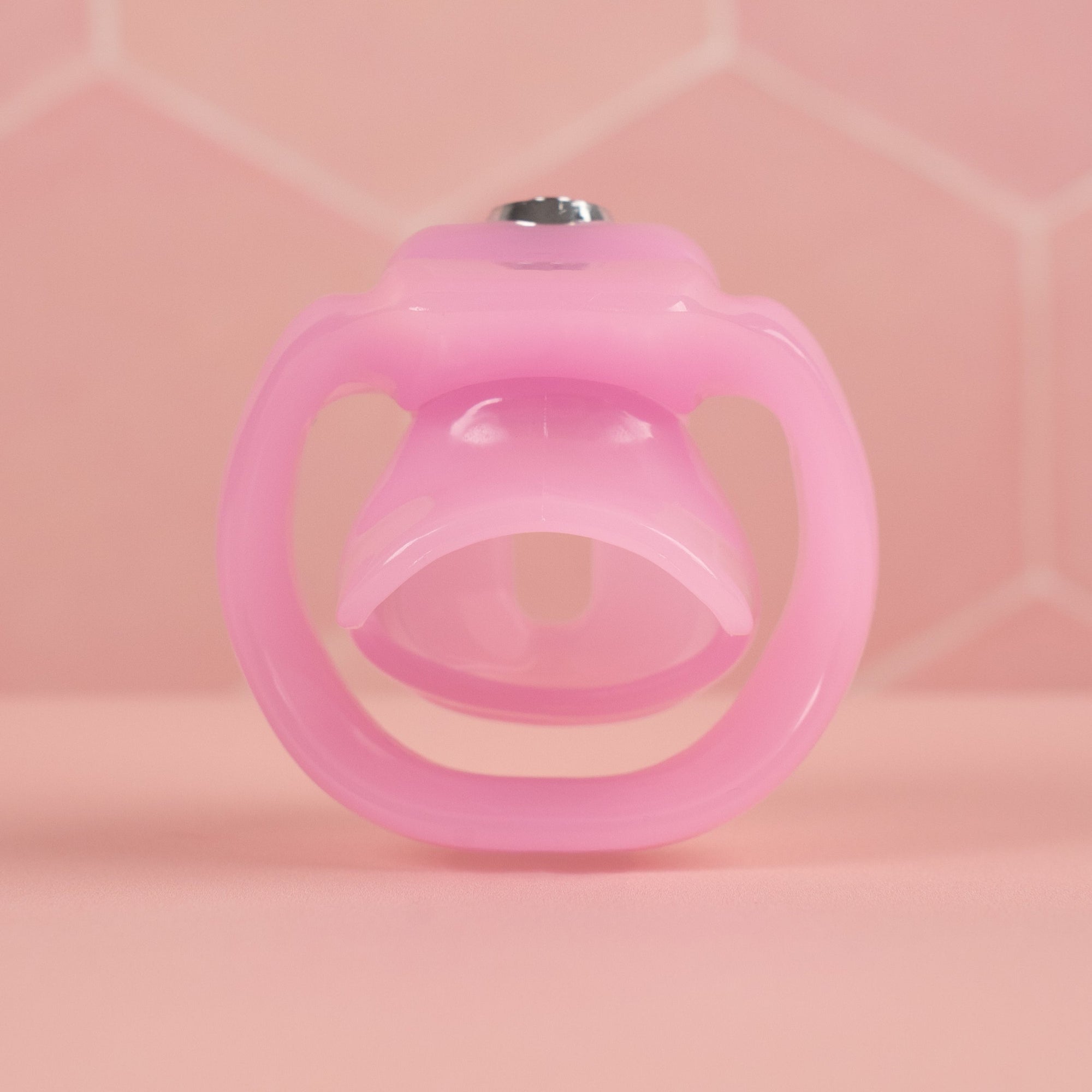 A rear view of the HT V5 Nub Pink chastity cage.