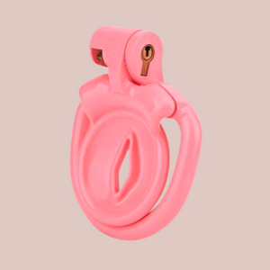 A side view of the Inverted Sissy Pussy chastity cage, you can see the Design 2 inverted face with a solid surround. The chastity cage is shown with its base ring and integral lock in place