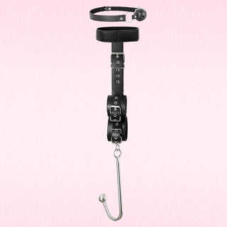 A black faux-leather bondage restraint set featuring a collar with a ball gag, a waist strap with buckles, and a leg cuffs with a silver metal J-hook, displayed against a light pink textured background.