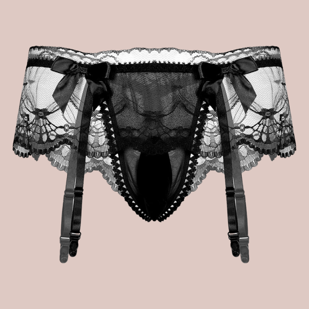 A close up of the black suspender belt and panties set for men, you can see how delicate the lace is and the pretty matching black bows.