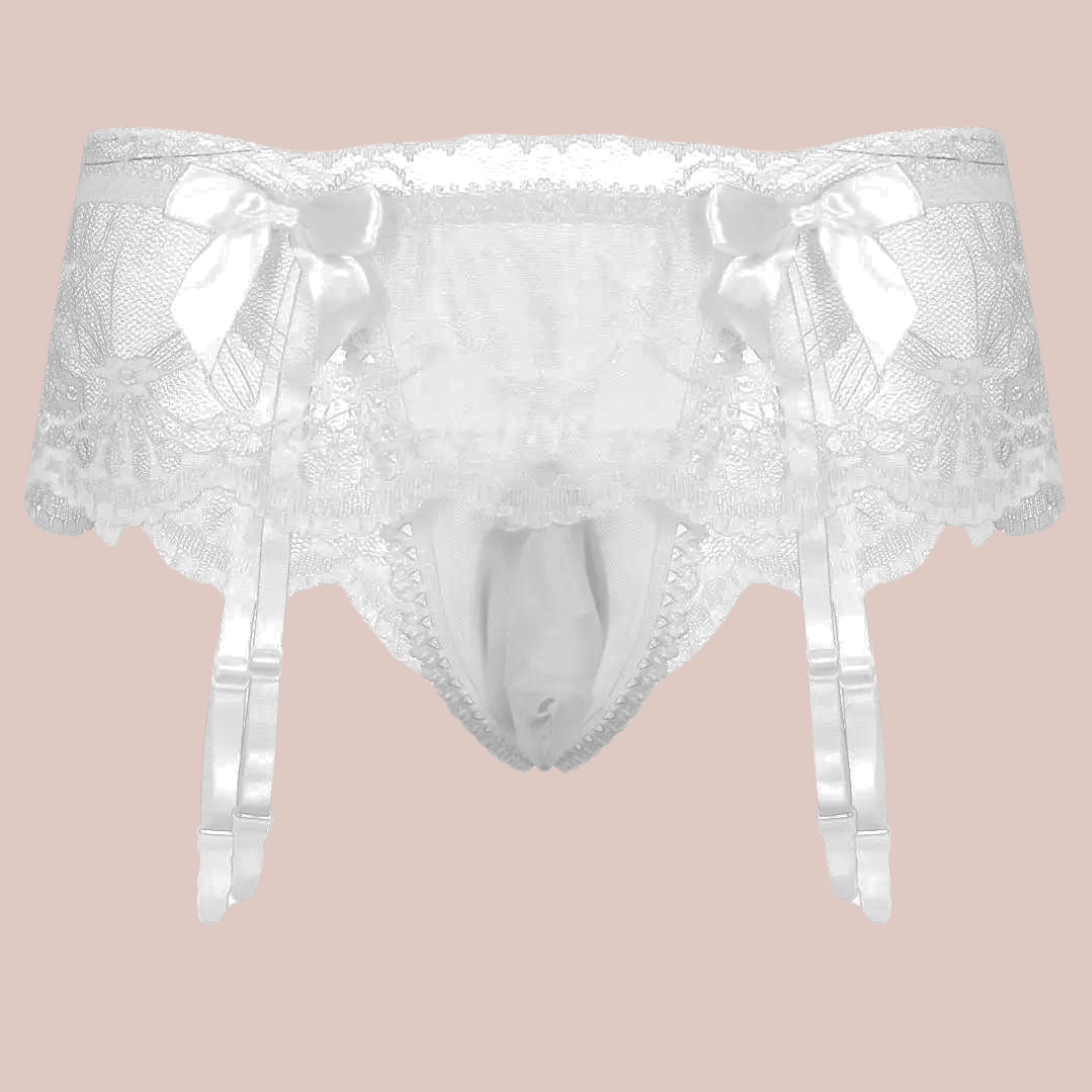 A close up of the white suspender belt and panties set for men, you can see how delicate the lace is and the pretty matching white bows.