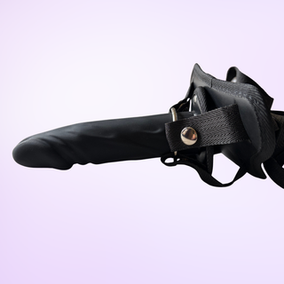 A side view of the Lumen Glide, the dildo can be seen emerging from the harness.