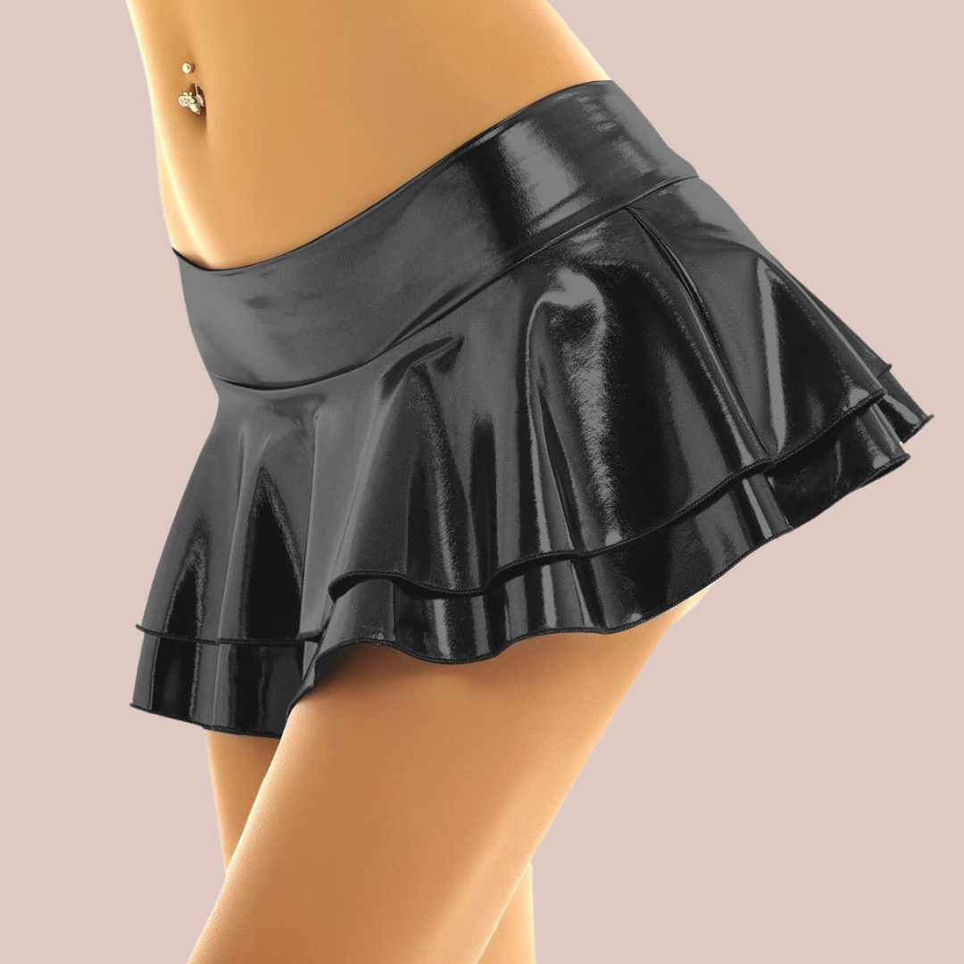 The black double layered mini skirt is being modelled to show how it looks when worn.