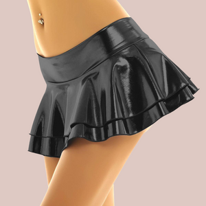The black double layered mini skirt is being modelled to show how it looks when worn.