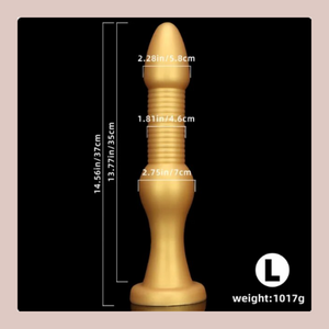 The dimensions of The Monster Anal Plug Large, it is shown here in gold.