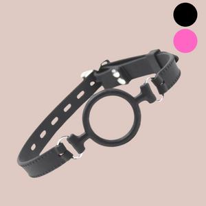 The black silicone o ring gag, you can see the thick adjustable strap that wraps around the head and the two colour circles on the top right denote the two colours available, black and pink.