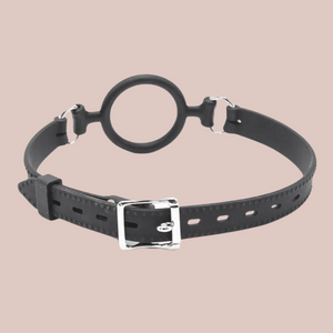 A back view of the black O Ring oral gag, you can see the silver lockable buck and the thick strap.