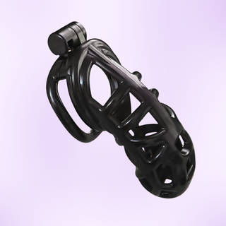 An angled view of the chastity cage on a purple background