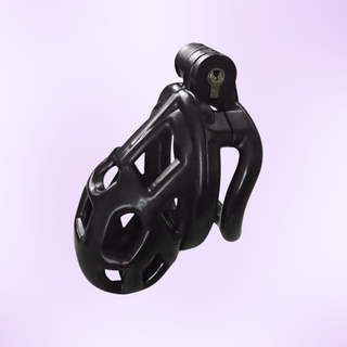 A side profile of the fully assembled chastity cage, it is shown with the integral lock fitted.