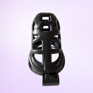 A view from above of the chastity cage, the cut out design can be seen, which allow air flow.