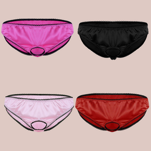 Showing the pale pink, rose pink, red and black versions of the open ring front panties from House Of Chastity. You can see the satin fabric and black edging.