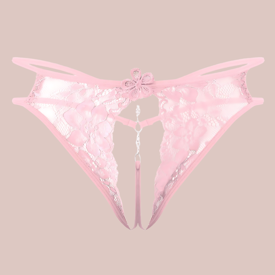 A close up of the pink Open Front Floral Lace G-String from House Of Chastity, they are shown flat.