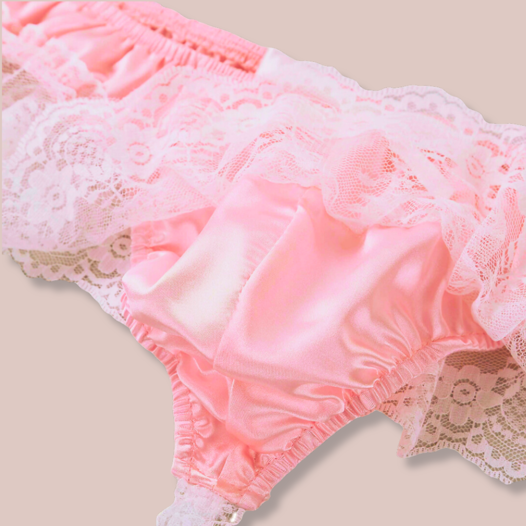 an alternate view of the peach satin panties from House Of Chastity, this image shows the roomy front of the panties.