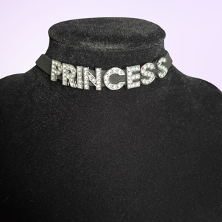 A close up of the Princess necklace on a model