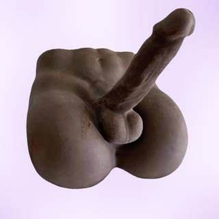 An alternate angle view of the torso on a purple background
