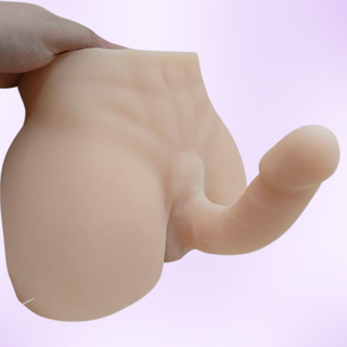 An angled view of the torso, the realistic penis is clear to see