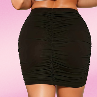 A rear view of the mini skirt, the ruched rear is clear to see