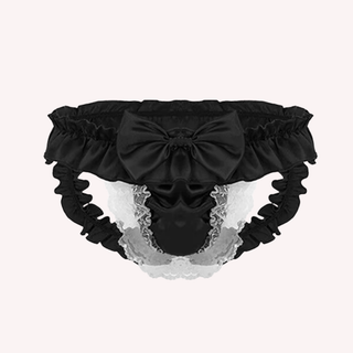 The black panties on a soft pink background