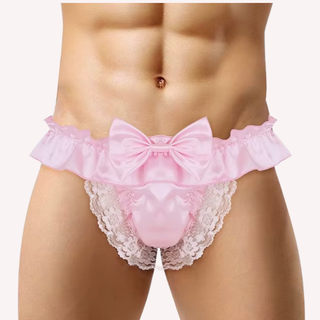 The pink satin panties shown being modelled, the large bow and lace detailing are clear to see.