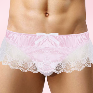 The pink panties shown on a model and in front of a pink background