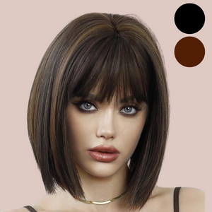 The brown sharp bob wig in brown, you can see how it grazes the shoulder, the  hightlights in the colouring and the soft fringe.