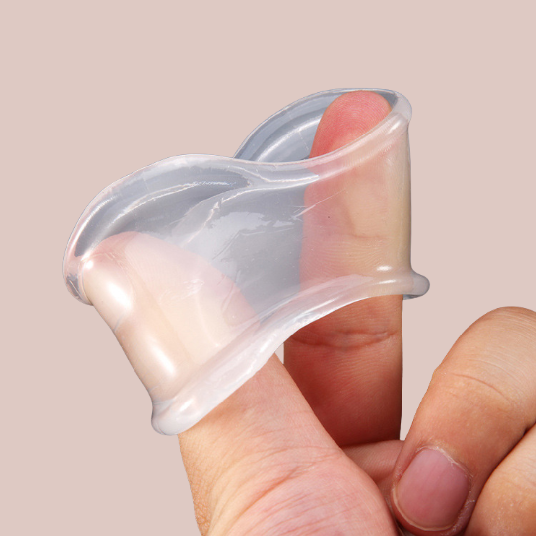 Shown in hand, this image advertises the new ball stretcher and proves just how malleable the scrotum stretcher is.