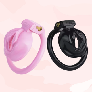 The pink and black versions of the Sissy Pussy II chastity cages, pink is on the left and black is on the right.